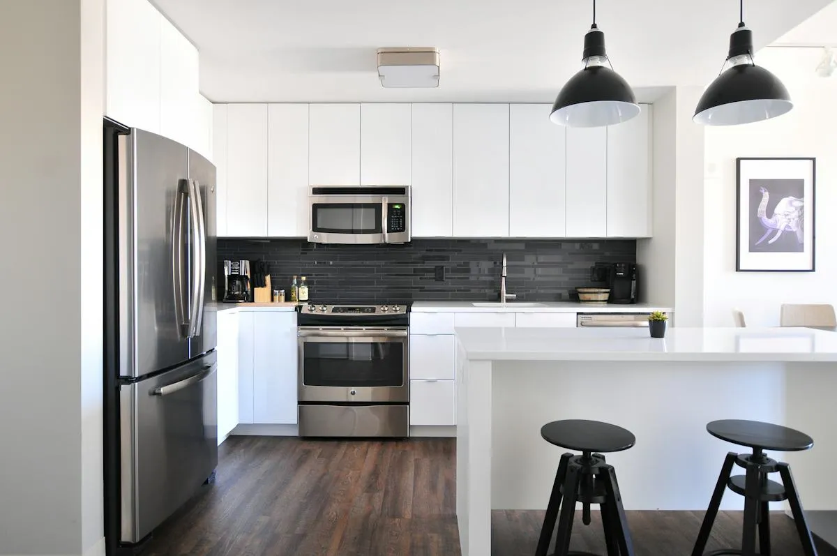 Bright modern kitchen with clean counters and cabinets