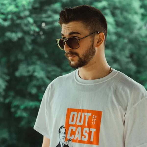 Man outdoors wearing sunglasses