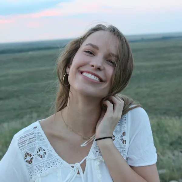 Portrait of a smiling woman outdoors