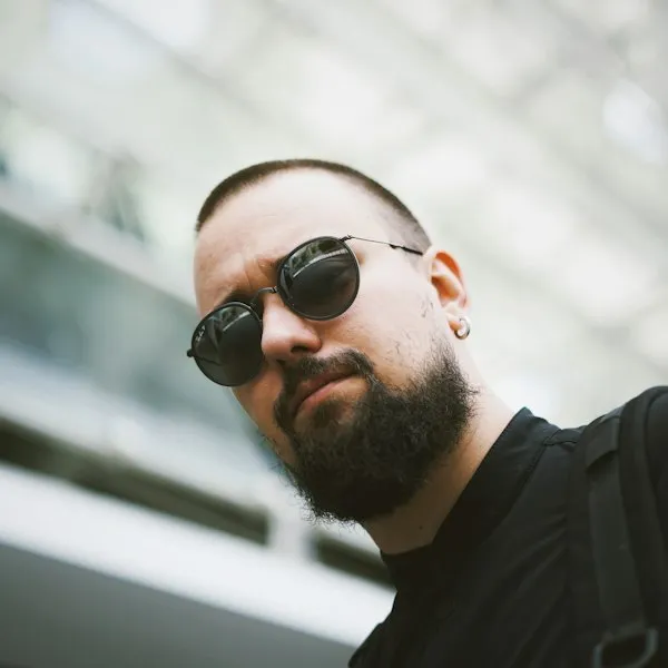Man wearing sunglasses in daylight