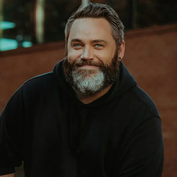 Portrait of a bearded man smiling